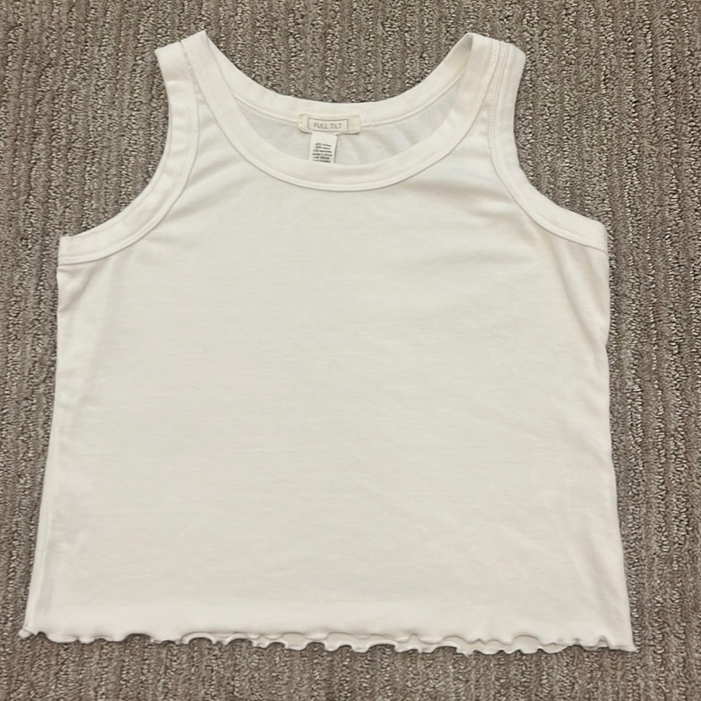 I am selling this white tank-top with ruffles on the bottom.